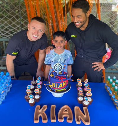 Ben and Grant helping Kian celebrate his birthday at NEAT HQ