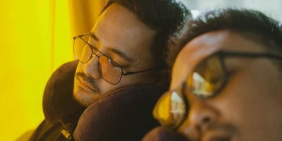 Memory foam travel pillow for neck support during flight