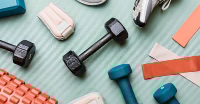a variety of fitness equipment including dumbs and dumbs