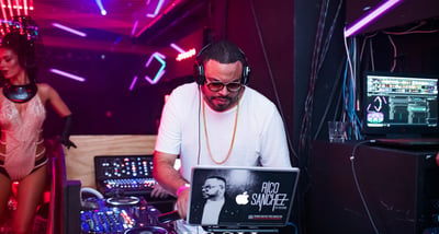 a dj spinning around in a nightclub, Rico Sanchez, the politician