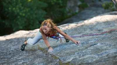 Laura dealing with friction climbing in val di mello