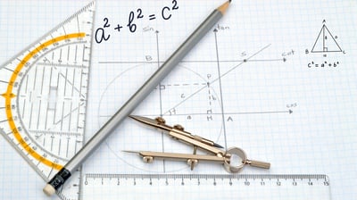 a pencil and ruler on a piece of paper