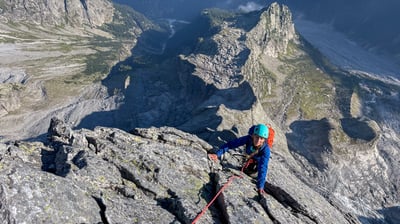 Climbing in the sun — High on the north ridge of Piz Badile.