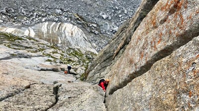 Climbing on Spigolo Gervasutti, Punta Allievi. Valmasino