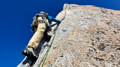 Hand jamming on Spigolo Vinci, Pizzo Cengalo. Valmasino, Italy