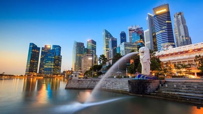 a cityscape of a city with a fountain