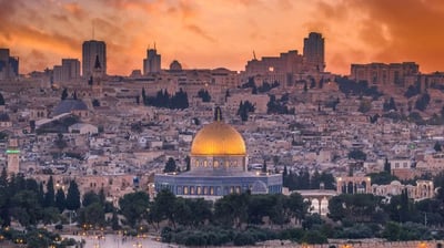 a cityscape of a city with a dome shaped building