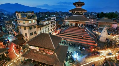 a city street scene with a view of a city