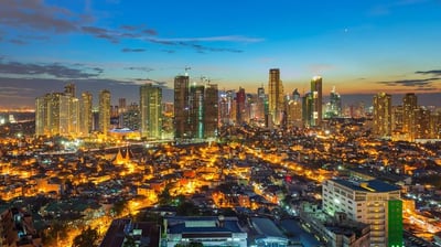 a cityscape of buildings and buildings in the evening