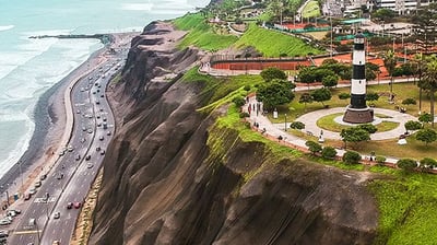 a view of a city with a lighthouse and a lighthouse