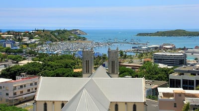 a church with a view of a harbor and a church