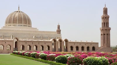 a large building with a large dome shaped building