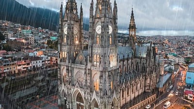 a large cathedral style building with a clock tower
