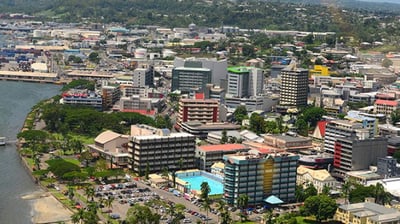 a city with a lot of buildings and a river