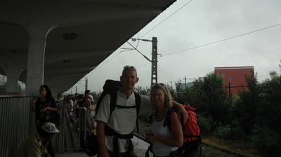 Nick and Tracey Billington on a train platform in China