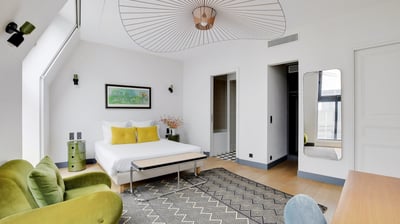 Aramis Suite at Villa Bastille – elegant queen bedroom with en-suite