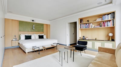 Athos Suite at Villa Bastille – master bedroom with projector and hammam