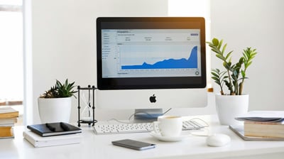 a computer displaying a data of charts