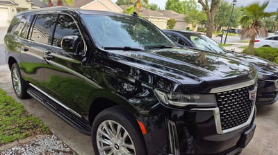 Dropping off JAX airport limousine passengers arrive home in Black Car SUV and Limo Sedan