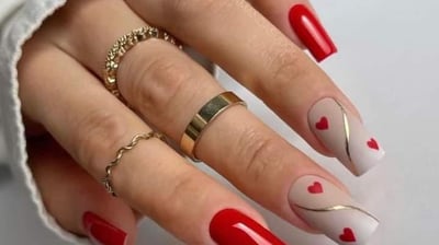 a woman's hand painted manicured manicured manicured manicured manicured
