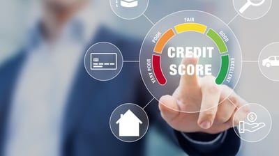 a man in a suit pointing at a credit score