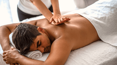 a man getting a massage at a massager