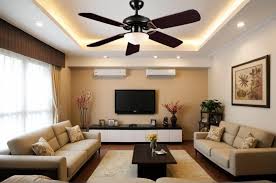 a modern living room with a ceiling fan