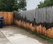 a fence during pressure washing