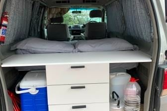 a explore africa camper van with a bed
