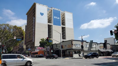 a wide shot of the Hotel Cecil as it currently stands in Downtown Los Angeles