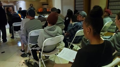 Hotel Cecil residents at a community meeting