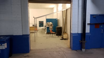 open roller shutter door in workshop
