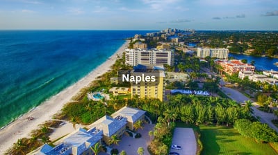 Beachfront aerial view in Naples Florida with oceanfront homes