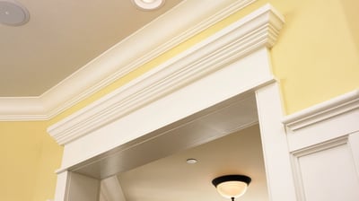 A beautiful and elegant door frame with doors. Example of door casing and door frame millwork.