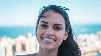a woman with sunglasses and sunglasses on a sunny day