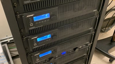 Audio equipment rack with multi-zone amplifiers