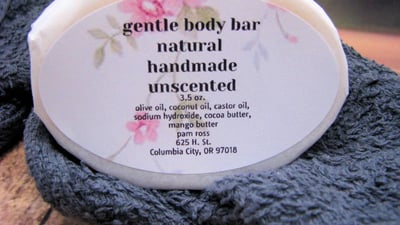 a soap bar with a label on it. Body handmade soap