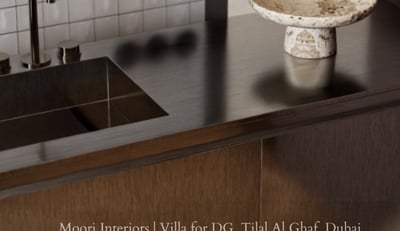 Modern sink area with a stainless steel countertop, white tiled backsplash, and a decorative bowl.