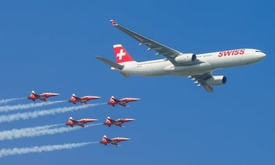 Commercial and defense aircraft in formation flight