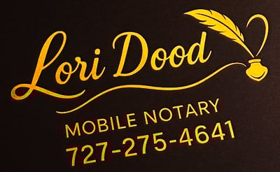 a business card with a gold foil foiled logo