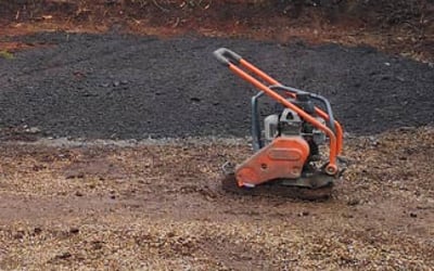 Petrol wacker plate compacting sub-base in Stourbridge