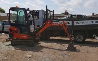 Compact digger on tight access site in Stourbridge