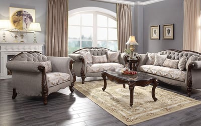 a living room with a hand carving sofa set and a table