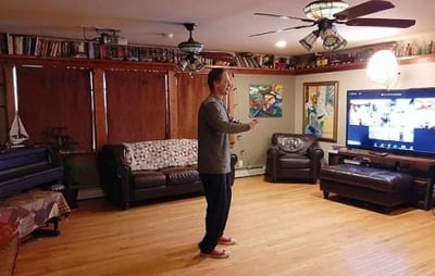 Johnny teaching Tai Chi for Health on Zoom from home.