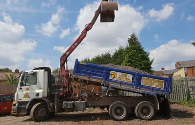 cmr grab and digger hire grabber lorry with company logo on the side