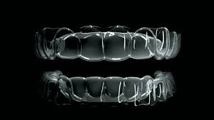 a pair of teeth with a black background