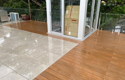 Rooftop floating decks of timber and tile.