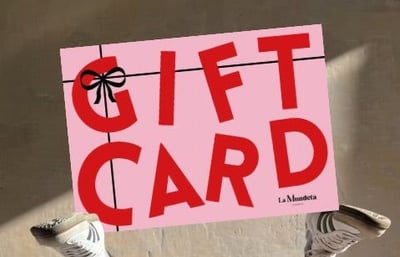 a person holding a sign that says gift card