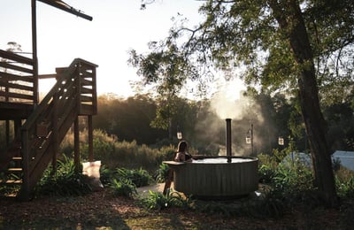 person enjoying hot tub on a retreat