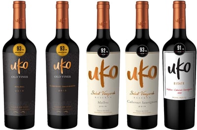 a variety of wine bottles with a variety of wines